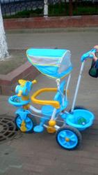 детский велосипед с ручкай